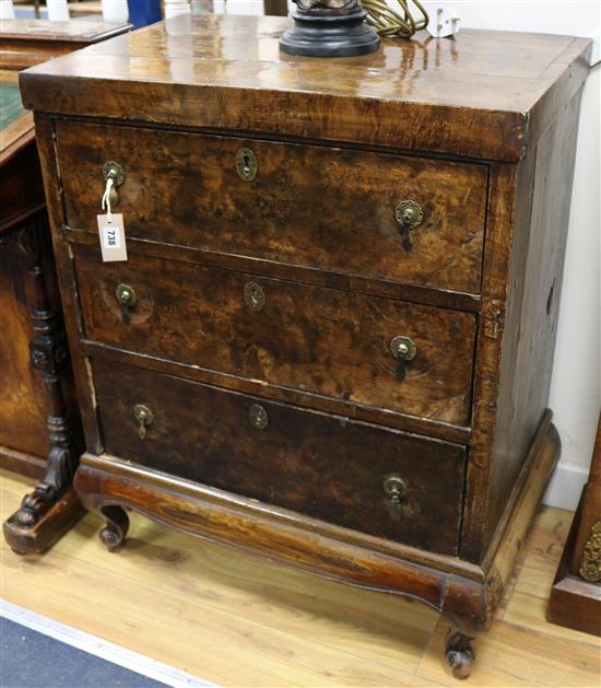 A walnut three drawer chest of drawers, W.68cm